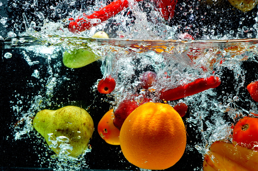 Various fresh and healthy fruit picture taken as they submerged dramatically into a clean water.